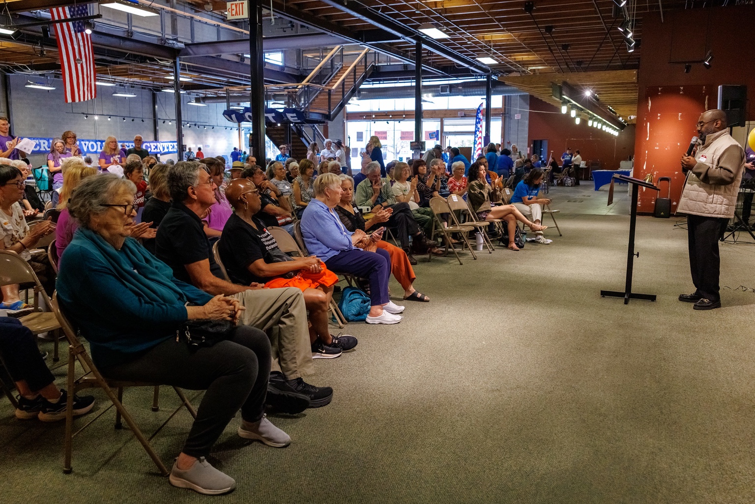 Audience members listening to Rev. Kaloma Smith