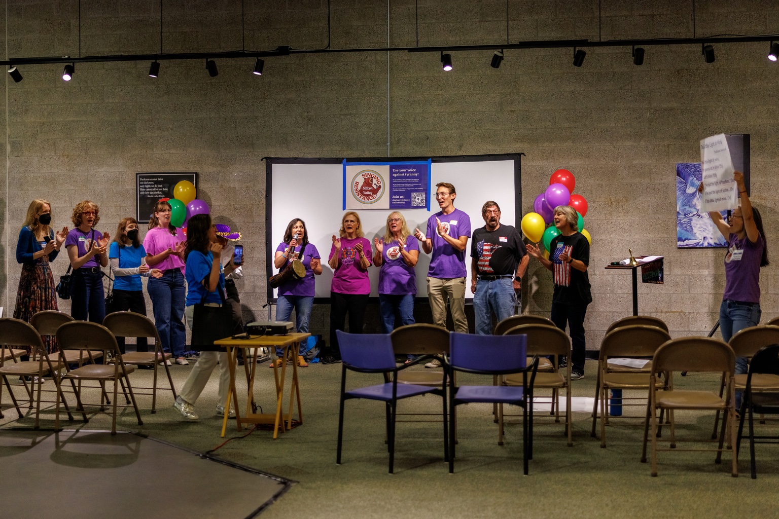Singing Resistance of Silicon Valley leading the room in song